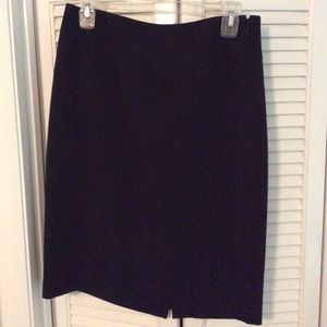 Straight black skirt   Side zipper.